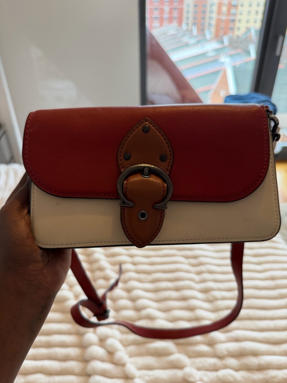 Coach Beat Crossbody Clutch in colorblock leather.